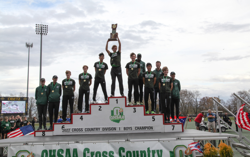 kids on award steps with medals and trophies