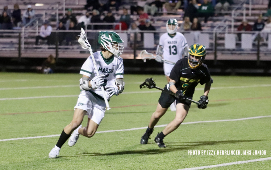 mason with the ball, opponent on tail