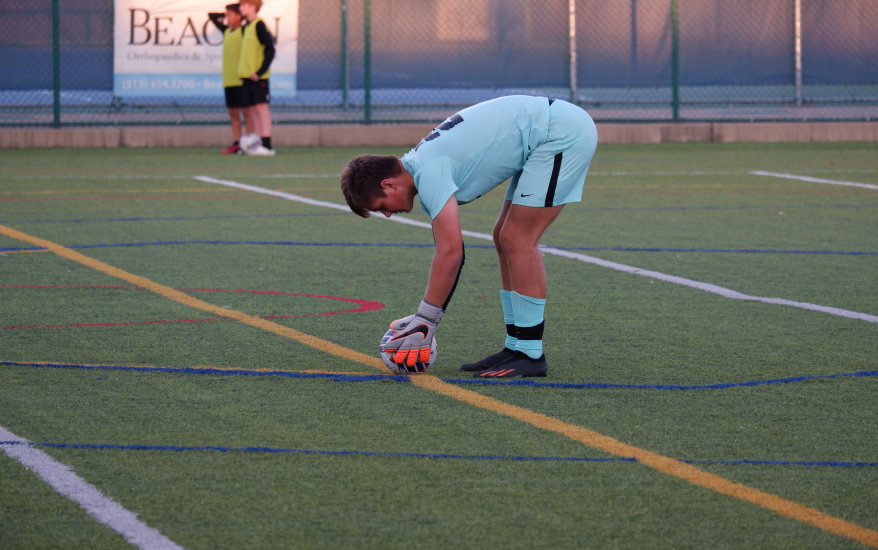 Player picking up ball