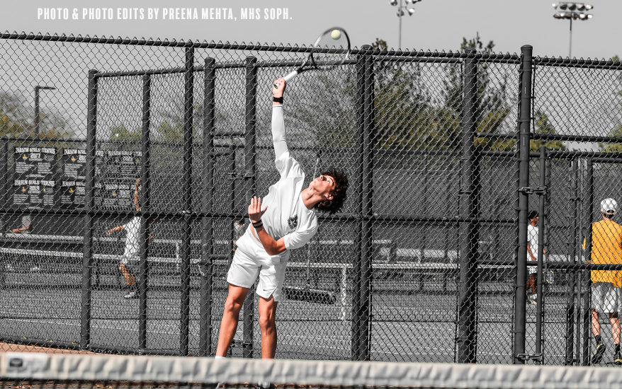 Boy playing tennis