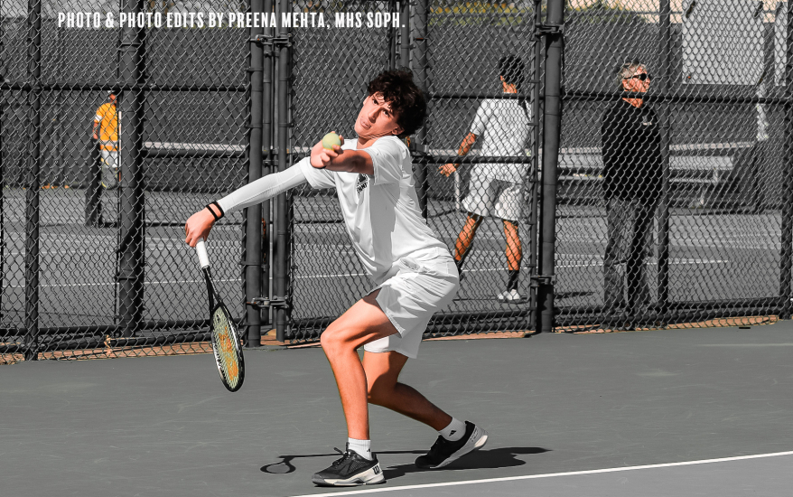 Boy playing tennis