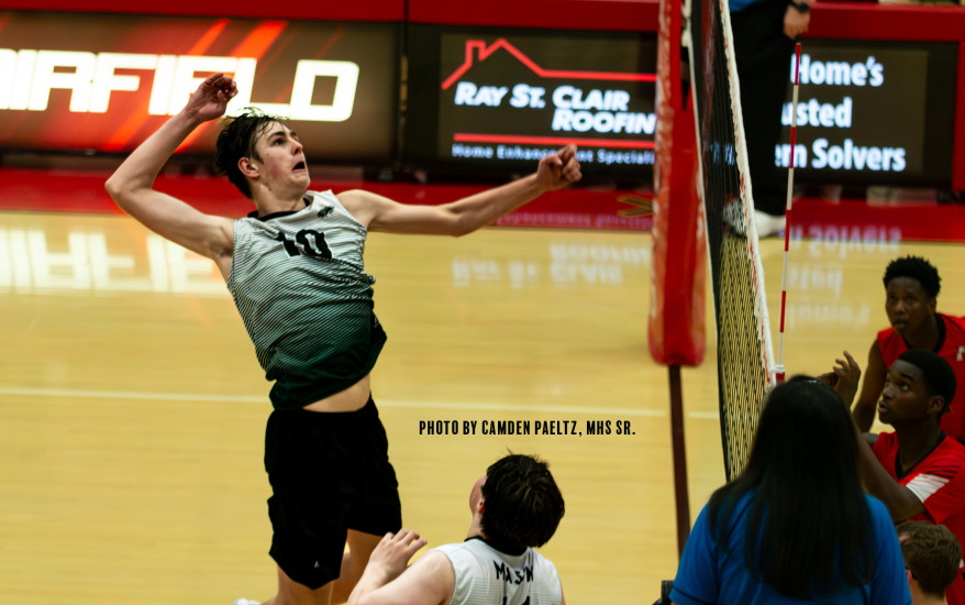 boys playing volleyball