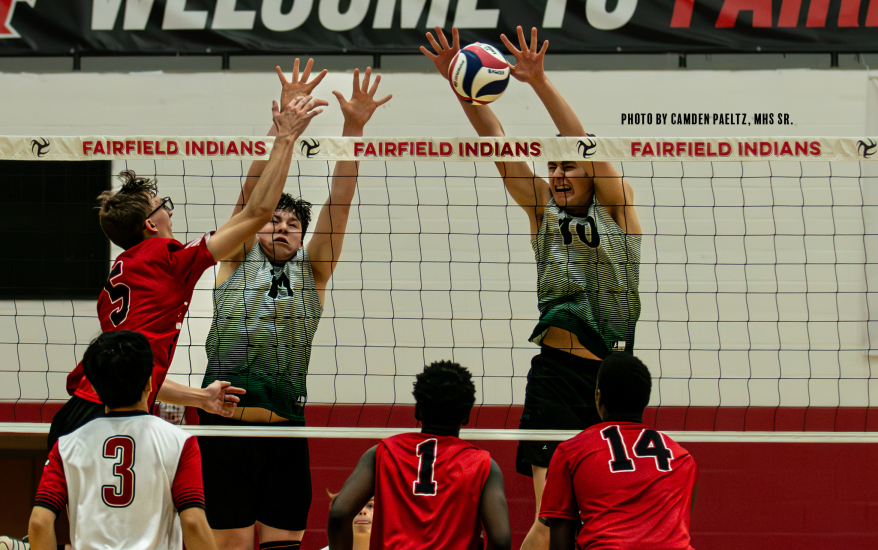 boys playing volleyball