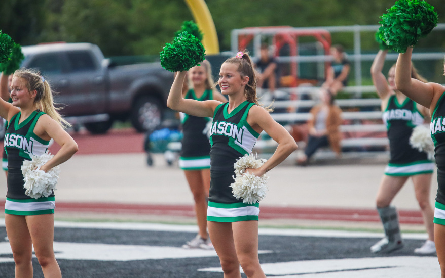 Girl raising pompom