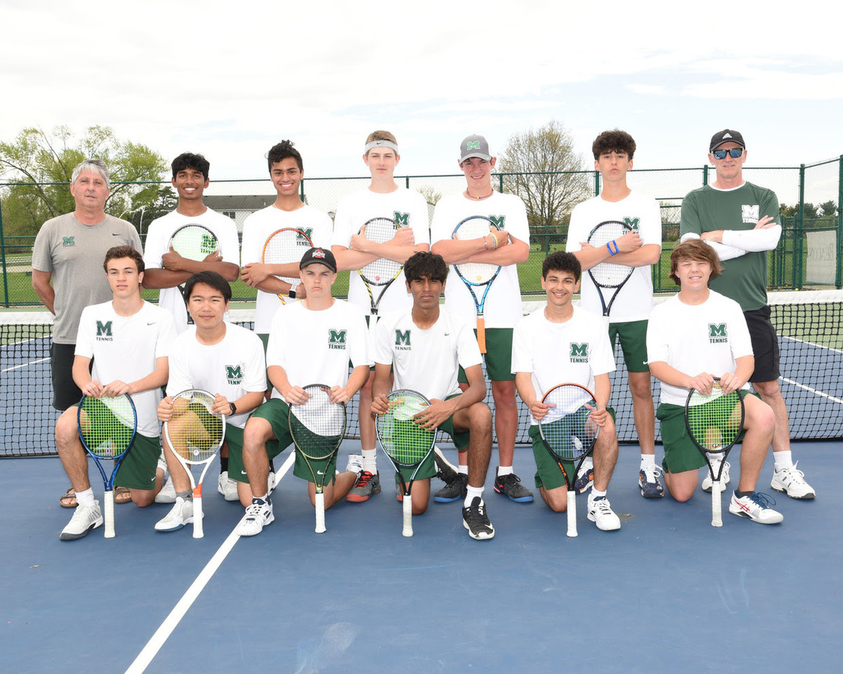 Boys Varsity Tennis Team on court