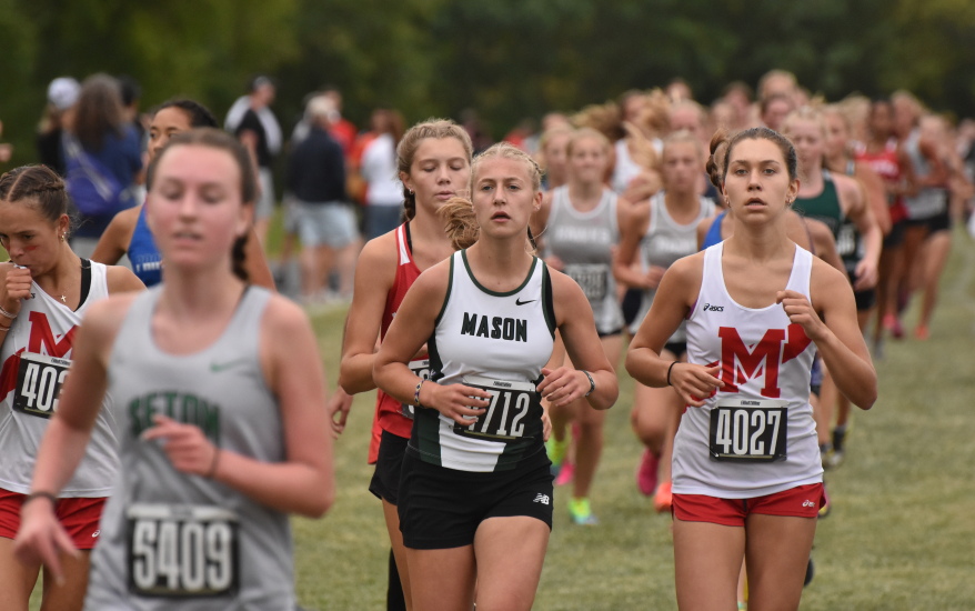 Mason girl in the middle of a pack of runners