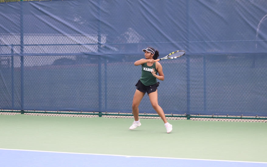 Player following through on a forehand swing